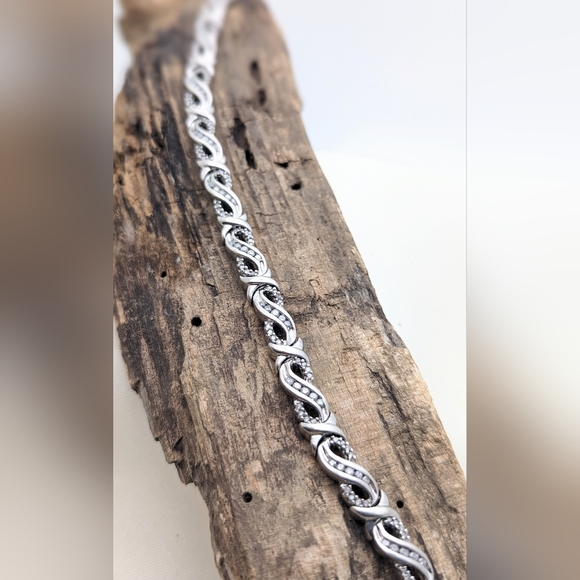 Genuine Diamond and Sterling Infinity Bracelet - Picture 4 of 7